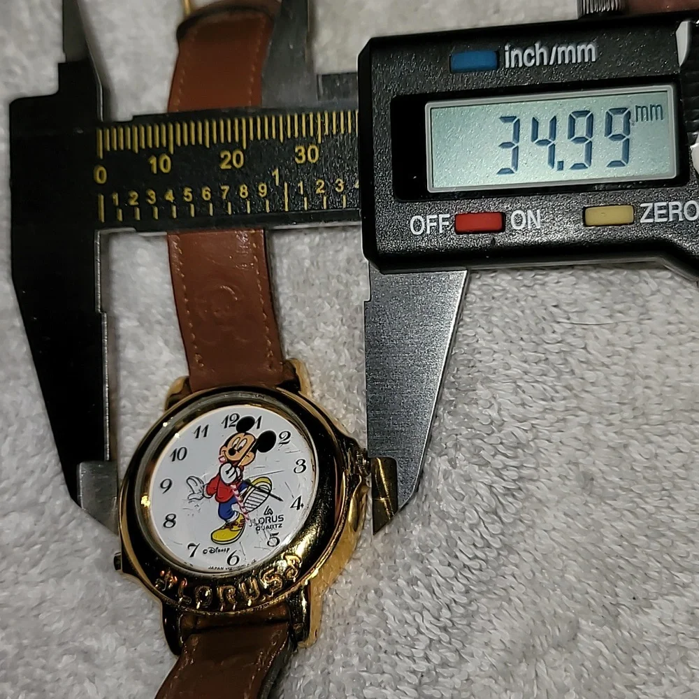 Vintage Lorus by Seiko Mickey Mouse Marching Musical Watch Women Gold‎ Tone V421